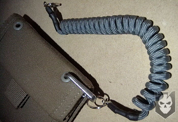 colour: BLACK PARACORD COILED LANYARD/ KEYRING FOR SECURING TACTICAL KIT 