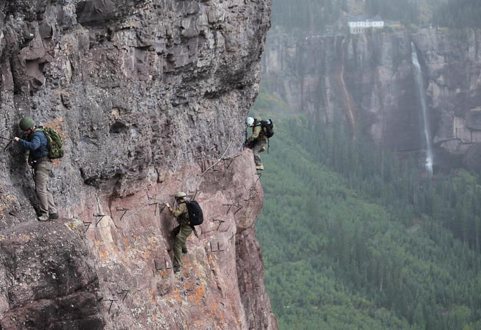 via ferrata on the side of a mountain