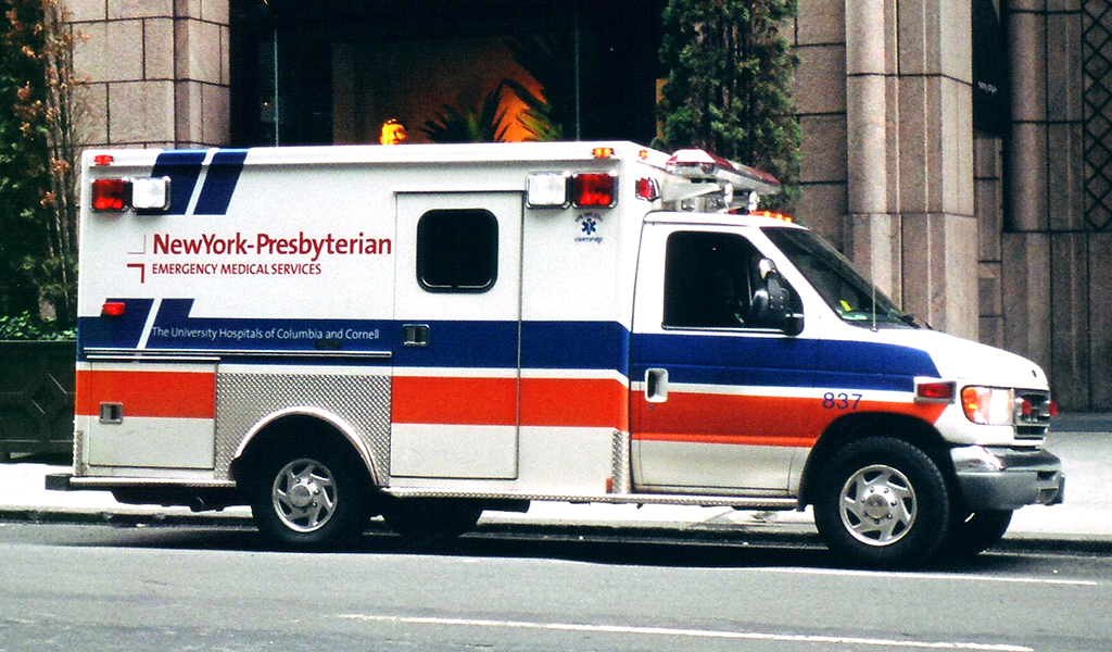 Ambulance Driving Down Street